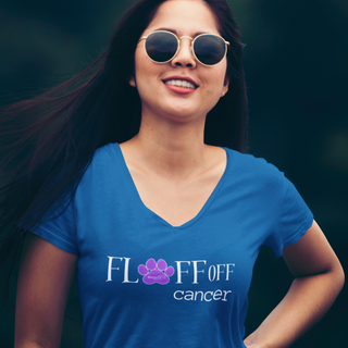 Lady wearing royal blue ladies Vneck tshirt that states Fl*ff Off cancer but the * is a pawprint with Benefit Beagle's Logo on the inside
