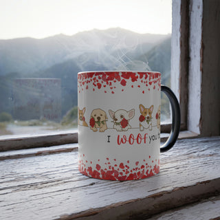 Color morphing mug with dogs holding roses in their mouths and the saying "I woof you too". Mug is white due to hot beverage contents.