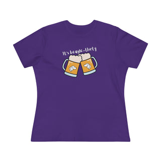 Beagle-Thirty Mugs Women's Premium Tee in Team Purple. The front of shirt showcases Two Dog Adorned Mugs clinking with the saying, "It's Beagle-Thirty" above it. Back of shirt features corresponding Benefit Beagle Logo.