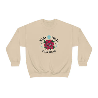 Stay Wild Unisex Heavy Blend Crewneck Sweatshirt in Sand. The Stay Wild Design features a tattoo style rose with the phrase "Stay Wild, Play Hard" around it. The back of shirt features the Stay Wild Benefit Beagle Logo Design.
