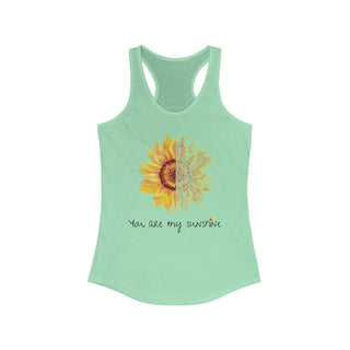 You are my Sunshine Women's Racerback Tank in Mint. Shown is the front showcasing a sunflower which is split down the middle and half is made out of paw prints. Underneath is the phrase "You are my Sunshine" . Back of shirt features the Sunflower Benefit Beagle Logo.