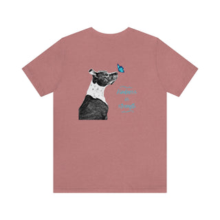 Lincoln Butterfly Unisex Jersey Short Sleeve Tee in Heather Mauve.  Shown is the back of shirt design showcasing profile of a dog with a blue butterfly on its nose and the phrase "Kindness is Strength" next to it. The front of shirt has Benefit Beagle Logo kissed by a Butterfly.