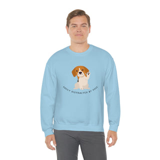 Easily Distracted Unisex Heavy Blend Crewneck Sweatshirt in Light Blue. Shown is front design featuring a dog waving with the saying "Easily Distracted by Dogs" below it. The back of shirt has the classic Benefit Beagle Logo.