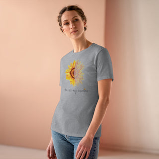 You are my Sunshine Women's Premium Tee shirt in Athletic Heather. Shown is the front showcasing a sunflower which is split down the middle and half is made out of paw prints. Underneath is the phrase "You are my Sunshine" . Back of shirt features the Sunflower Benefit Beagle Logo.