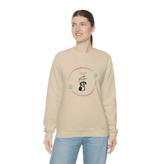 Dog Hair is my Glitter Unisex Crewneck in Sand. The Dog Hair is my Glitter design features a dog with the phrase "Dog Hair is my Glitter" above it and it is surrounded by a circle with paw prints.