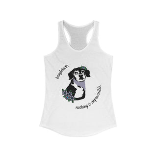 Signature Tattoo Flowers Women's Ideal Racerback Tank in White. Shown is front of shirt with the Signature Tattoo Flowers design featuring a dog with flowers around it and the phrase "Beagletude" and "Nothing is Impawssible". Back of shirt features the Benefit Beagle Logo.