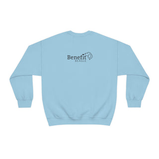 Easily Distracted Unisex Heavy Blend Crewneck Sweatshirt in Light Blue. Shown is back design with the classic Benefit Beagle Logo. The front design features a dog waving with the saying "Easily Distracted by Dogs" below it.