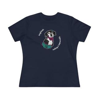 Signature Tattoo Roses Women's Premium Tee in Navy. Shown is front of shirt with the Signature Tattoo Roses design featuring a dog with roses around it and the phrase "Beagletude" and "Nothing is Impawssible". Back of shirt features the Benefit Beagle Logo.