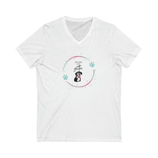 Dog Hair is my Glitter Unisex Jersey V-Neck Tee in White. The Dog Hair is my Glitter design features a dog with the phrase "Dog Hair is my Glitter" above it and it is surrounded by a circle with paw prints.