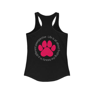 Different Pawspective Women's Racerback Tank in Black. Shown is the back of shirt featuring a large colorful pawprint with the the phrase "Life is all about finding the beauty in a different pawspective" circled around it. The Benefit Beagle Logo is located in the top corner on the front of shirt.