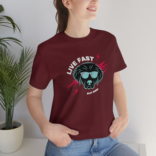 Play Hard Unisex Jersey Short Sleeve Tee Shirt in Maroon. The design features a cool dog with sunglasses and lightening bolts arond it. The phrase "Live Fast, Play Hard" is around the design.