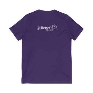 Adventures Await Unisex V-Neck Tee in Team Purple. Shown is the back of shirt with a Nautical Compass Benefit Beagle Logo. The front of shirt features the Adventures Await design with a dog inside a nautical compass and the words "Adventures Await" above it.