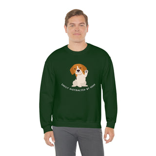 Easily Distracted Unisex Heavy Blend Crewneck Sweatshirt in Forest Green. Shown is front design featuring a dog waving with the saying "Easily Distracted by Dogs" below it. The back of shirt has the classic Benefit Beagle Logo.