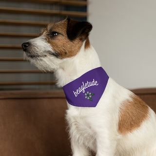 Dog wearing the Signature Tattoo Flower Dog Collar Bandana in Purple. The Signature Tattoo Flower design features the word "beagletude" with a tattoo style flower under it. Comes with adjustable black collar.