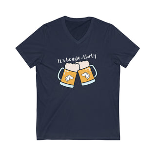 Beagle-Thirty Mugs Unisex Short Sleeve V-Neck Tee in Navy. The front of shirt showcases Two Dog Adorned Mugs clinking with the saying, "It's Beagle-Thirty" above it. Back of shirt features corresponding Benefit Beagle Logo.