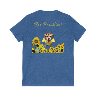 Bee Pawsitive Unisex V-neck Tee shirt in Heather True Royal. Shown is back of shirt showcasing a dog dressed as as bee in a a field of sunflowers with the phrase "Bee Pawsitive!" above it. The front features the Bee Pawsitive Benefit Beagle Logo.