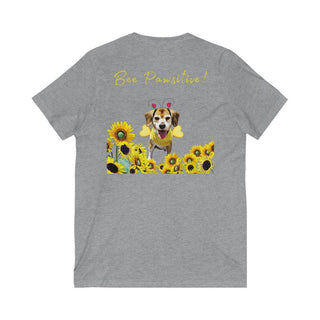 Bee Pawsitive Unisex V-neck Tee shirt in Athletic Heather. Shown is back of shirt showcasing a dog dressed as as bee in a a field of sunflowers with the phrase "Bee Pawsitive!" above it. The front features the Bee Pawsitive Benefit Beagle Logo.