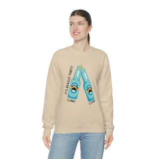 Beagle-Thirty Bottles Unisex Heavy Blend Crewneck Sweatshirt in Sand. The front of shirt showcases Two Paw Labeled Bottles clinking with the saying, "It's Beagle-Thirty". Back of shirt features corresponding Benefit Beagle Logo.