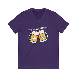 Beagle-Thirty Mugs Unisex Short Sleeve V-Neck Tee in Team Purple. The front of shirt showcases Two Dog Adorned Mugs clinking with the saying, "It's Beagle-Thirty" above it. Back of shirt features corresponding Benefit Beagle Logo.