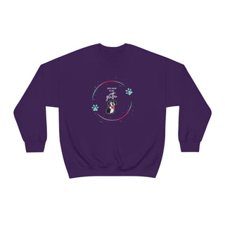 Dog Hair is my Glitter Unisex Crewneck in Purple. The Dog Hair is my Glitter design features a dog with the phrase "Dog Hair is my Glitter" above it and it is surrounded by a circle with paw prints.