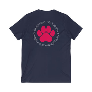 Different Pawspective Unisex V-Neck Tee in Navy. Shown is the back of shirt featuring a large colorful pawprint with the the phrase "Life is all about finding the beauty in a different pawspective" circled around it. The Benefit Beagle Logo is located in the top corner on the front of shirt.