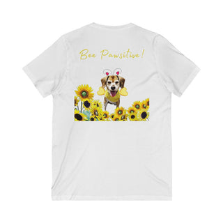 Bee Pawsitive Unisex V-neck Tee shirt in White. Shown is back of shirt showcasing a dog dressed as as bee in a a field of sunflowers with the phrase "Bee Pawsitive!" above it. The front features the Bee Pawsitive Benefit Beagle Logo.