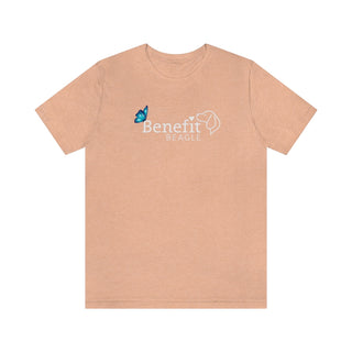 Lincoln Butterfly Unisex Jersey Short Sleeve Tee in Peach. Shown is the front of shirt with Benefit Beagle Logo kissed by butterfly. The back of shirt showcases profile of a dog with a blue butterfly on its nose and the phrase "Kindness is Strength" next to it.