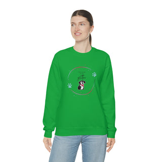 Dog Hair is my Glitter Unisex Crewneck in Irish Green. The Dog Hair is my Glitter design features a dog with the phrase "Dog Hair is my Glitter" above it and it is surrounded by a circle with paw prints.