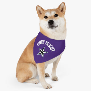 Dog wearing the Brightest Star Pet Bandana Collar in Purple. The Brightest Star design features the phrase "Shine Bright" with a nautical star. Comes with adjustable black collar.