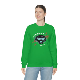 Play Hard Unisex Heavy Blend Crewneck Sweatshirt in Irish Green. The design features a cool dog with sunglasses and lightening bolts around it. The phrase "Live Fast, Play Hard" is around the design.