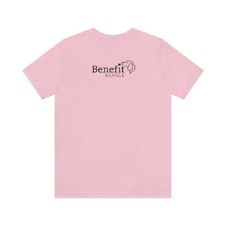 Signature Tattoo Flowers Unisex Jersey Short Sleeve Tee in Pink. Shown is back of shirt with the Benefit Beagle Logo. Front of shirt has the Signature Tattoo Flowers design featuring a dog with flowers around it and the phrase "Beagletude" and "Nothing is Impawssible".