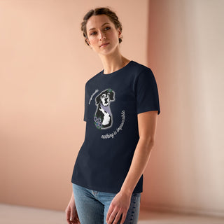 Signature Tattoo Flowers Women's Premium Tee in Navy. Shown is front of shirt with the Signature Tattoo Flowers design featuring a dog with flowers around it and the phrase "Beagletude" and "Nothing is Impawssible". Back of shirt features the Benefit Beagle Logo.