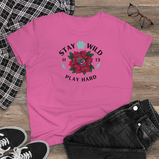 Stay Wild Women's Midweight Cotton Tee in Azalea. Shown is front of Stay Wild Design features a tattoo style rose with the phrase "Stay Wild, Play Hard" around it. The back of shirt features the Stay Wild Benefit Beagle Logo Design.