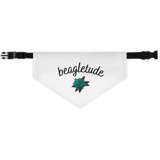 The Signature Tattoo Roses Dog Collar Bandana in White. The Signature Tattoo Roses design features the word "beagletude" with a tattoo style rose under it. Comes with adjustable black collar.