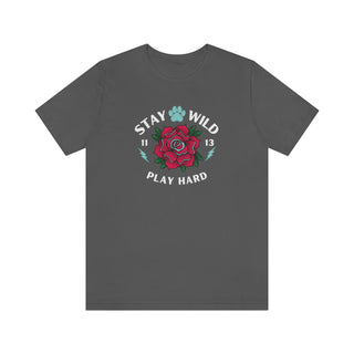 Stay Wild Unisex Premium Tee in Asphalt. Shown is front of Stay Wild Design features a tattoo style rose with the phrase "Stay Wild, Play Hard" around it. The back of shirt features the Stay Wild Benefit Beagle Logo Design.