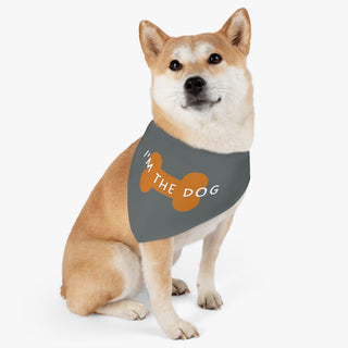 Dog wearing Easily Distracted Dog Collar Bandana in Grey. The design features a large dog bone with the words, "I'M THE DOG" written across it. Comes with adjustable black collar.