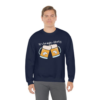 Beagle-Thirty Mugs Unisex Heavy Blend Crewneck Sweatshirt in Navy. The front of shirt showcases Two Dog Adorned Mugs clinking with the saying, "It's Beagle-Thirty" above it. Back of shirt features corresponding Benefit Beagle Logo.