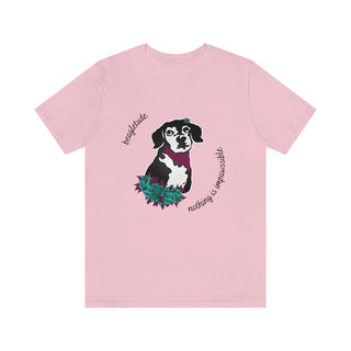 Signature Tattoo Roses Unisex Short Sleeve Tee in Pink. Shown is front of shirt with the Signature Tattoo Roses design featuring a dog with roses around it and the phrase "Beagletude" and "Nothing is Impawssible". Back of shirt features the Benefit Beagle Logo.