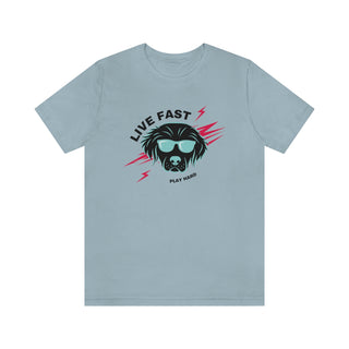 Play Hard Unisex Jersey Short Sleeve Tee Shirt in Light Blue. The design features a cool dog with sunglasses and lightening bolts around it. The phrase "Live Fast, Play Hard" is around the design.