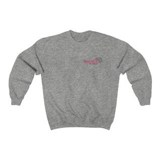 Different Pawspective Unisex Crewneck Sweatshirt in Sport Grey. Shown is front of shirt with Benefit Beagle logo in the top corner . On the back is large colorful pawprint with the the phrase "Life is all about finding the beauty in a different pawspective" circled around it.