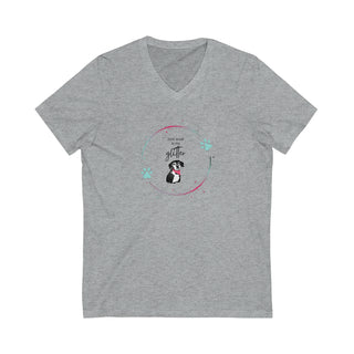 Dog Hair is my Glitter Unisex Jersey V-Neck Tee in Athletic Heather. The Dog Hair is my Glitter design features a dog with the phrase "Dog Hair is my Glitter" above it and it is surrounded by a circle with paw prints.