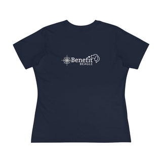 Adventures Await Women's Premium Tee in Navy. Shown is the back of shirt with a Nautical Compass Benefit Beagle Logo. The front of shirt features the Adventures Await design with a dog inside a nautical compass and the words "Adventures Await" above it.