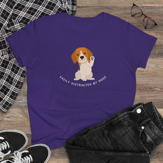 Easily Distracted Women's Midweight Cotton Tee in Team Purple. Shown is front design featuring a dog waving with the saying "Easily Distracted by Dogs" below it. The back of shirt has the classic Benefit Beagle Logo.