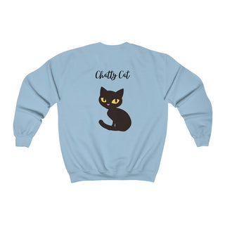 Meow Unisex Crewneck Sweatshirt in Light Blue. Shown is back showcasing a wide eyed black cartoon cat with the phrase "Chatty Cat" above it. On front of shirt is the Benefit Beagle Logo featuring a peeping cat.