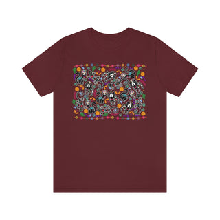 Dia De Los Muertos Unisex Jersey Short Sleeve Tee Shirt in Maroon. Shown is the front of shirt featuring print of dogs and cats with Dia de los Muertos traditional decorations. On the back is a similar Benefit Beagle Logo.