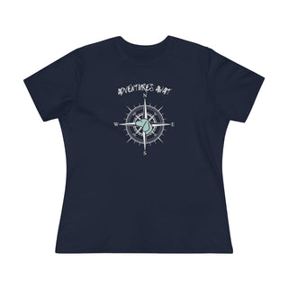 Adventures Await Women's Premium Tee in Navy. The front of shirt features the Adventures Await design with a dog inside a nautical compass and the words "Adventures Await" above it. The back of the shirt has similar Benefit Beagle Logo.