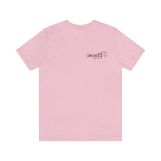 Live in the Moment Unisex Short Sleeve Tee in Pink. The Live in the Moment design features the Benefit Beagle logo in the top corner of the garment.