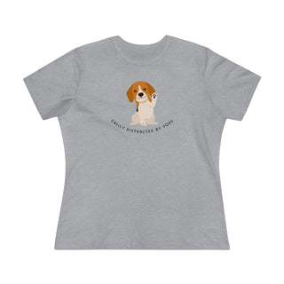 Easily Distracted Women's Premium Tee in Athletic Heather. Shown is front design featuring a dog waving with the saying "Easily Distracted by Dogs" below it. The back of shirt has the classic Benefit Beagle Logo.