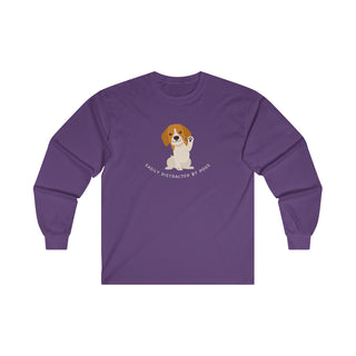 Easily Distracted Ultra Cotton Long Sleeve Tee in Purple. Shown is front design featuring a dog waving with the saying "Easily Distracted by Dogs" below it. The back of shirt has the classic Benefit Beagle Logo.