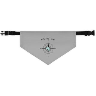 Grey dog collar bandana with the Adventures Await design features a nautical compass with the profile of a dog in the center. Comes with adjustable black collar. 